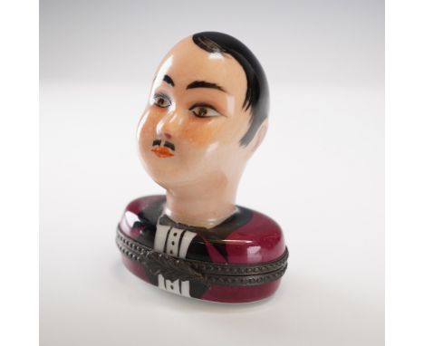 Charming hand-painted Limoges figural porcelain trinket box in the form of a dapper gentleman with a stylized 19th-century ap
