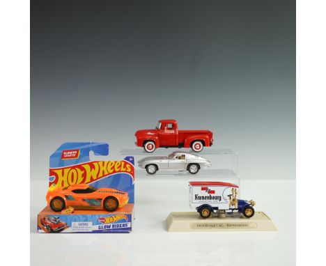 4pc lot featuring a red 1956 Ford pickup diecast model with detailed whitewall wheels and interior, a silver 1963 Corvette St