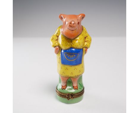 Hand-painted Limoges porcelain trinket box in the shape of an upright pig dressed in a cheerful yellow dress with red speckle