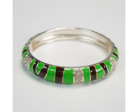 Striking bangle bracelet by Sequin featuring alternating green and brown enamel stripes accented with clear crystal-set bands