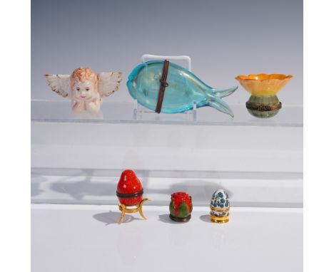 This eclectic and charming group features six petite keepsake boxes crafted in a variety of materials and whimsical forms. In