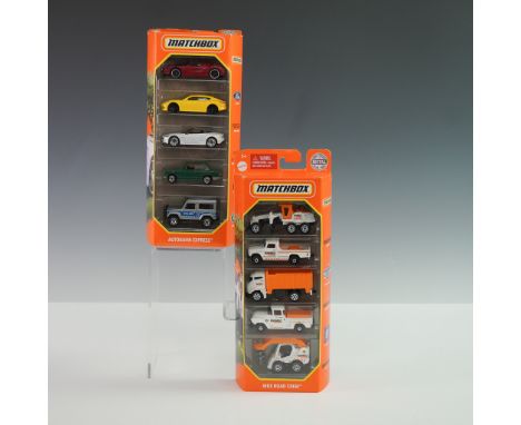 Two factory-sealed Matchbox 5-car vehicle sets featuring highly detailed die-cast models. The "Autobahn Express" set includes