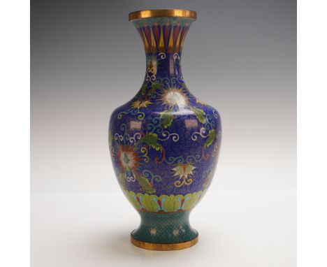 Striking Chinese cloisonne vase of baluster form, featuring intricate floral and foliate designs in vibrant enamel against a 