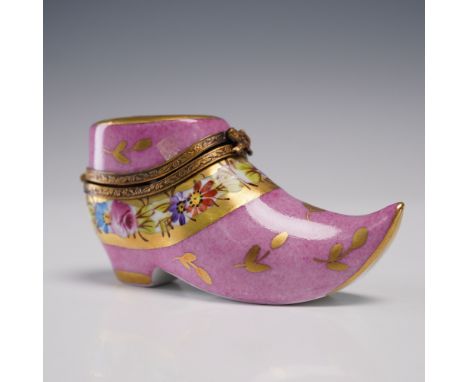 Limoges France, late 20th century. Hand-painted pink porcelain shoe-form box with a curved pointed toe, adorned with polychro