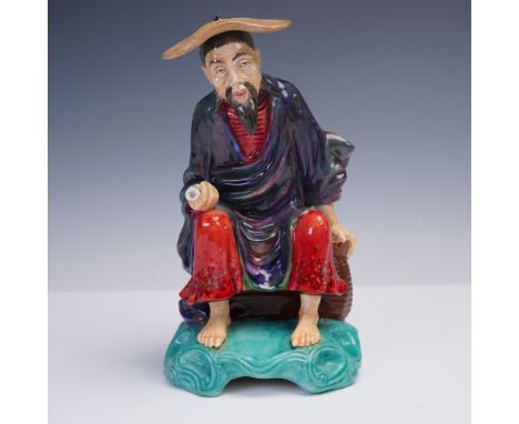 This expressive figurine by studio potter Reg Johnson captures a seated Tibetan storyteller in vivid, multicolored glaze. Han