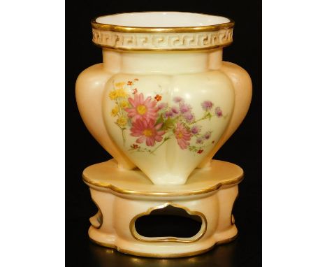 A Royal Worcester blush ivory vase, decorated with flower sprays below a Greek key gilt border, on integrated stand, shape co