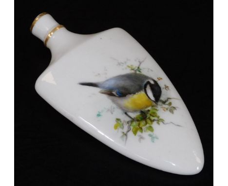 An early 20thC Royal Worcester porcelain perfume bottle, of shield form, handpainted with a blue tit and flowers to the rever
