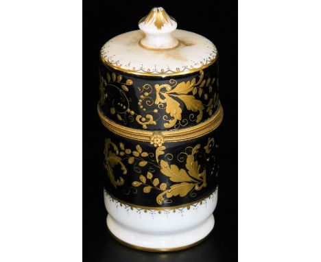 A Paris enamel cylindrical jar and cover, with gilt mounts, the body with a black and white ground, set with various leaves i
