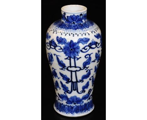 A 19thC Chinese blue and white porcelain baluster vase, decorated with tassels and leaves between diaper borders, the base be