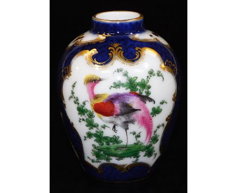 A Samson porcelain tea caddy and cover, decorated with blue scale ground and panels with exotic birds, after Worcester, blue 