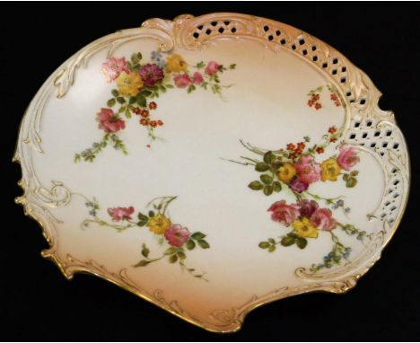 A Royal Worcester blush ivory plate, decorated with flowers and grapes, shape no. 1426, green mark beneath, 1903, 22cm Dia.  