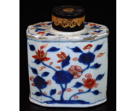 An 18thC Chinese Imari porcelain tea caddy, decorated with flowers, of octagonal form with metal lid, unglazed base, 12cm H. 