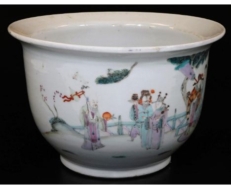 A Chinese porcelain jardiniere with everted lip, decorated with Shao Lao and his attendants in a garden, the reverse with poe