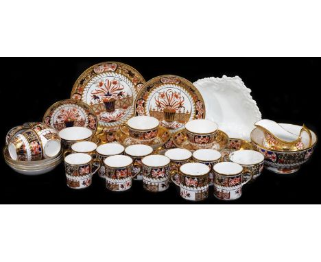 An extensive Spode Imari tea set, comprising of ten coffee cans, eight tea cups, eleven saucers, slop bowl, creamers and two 