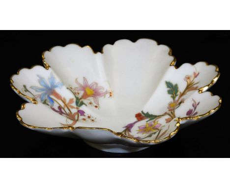 A Royal Worcester blush ivory shallow dish, decorated with stylized flower groups, shape code 1404, puce marked, 1891, 16cm D