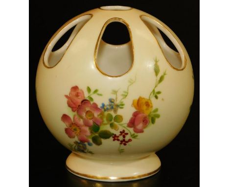 A Royal Worcester blush ivory pierced circular potpourri vase, decorated with flowers, shape code 991, 1906, 9cm H.  There is