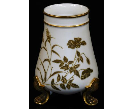 A late 19thC Royal Worcester vase, of circular form, raised with gilt coloured wheat and leaves, on hairy paw feet with an up