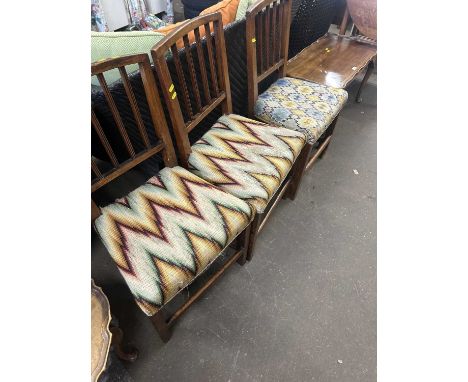 A set of three 19th Century elm framed dining chairs with tapestry seats