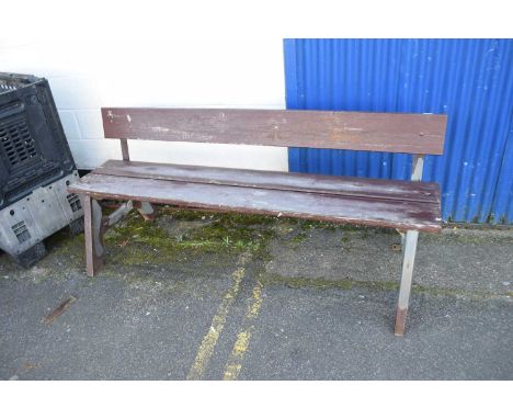 A metal and plank wood bench