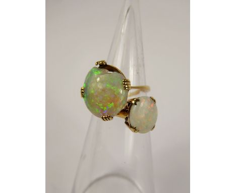 Two Lady's 9ct Yellow Gold Opal Ring, one 10 x 8 mm size P and the other 14 x 12 mm (damaged) size P, combined weight 4 gms