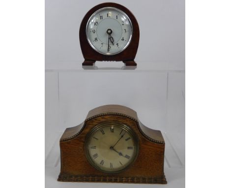 An Edwardian Oak Cased Mantel Clock, with French movement and Roman numerals, together with a vintage Smith Sectric Bakelite 