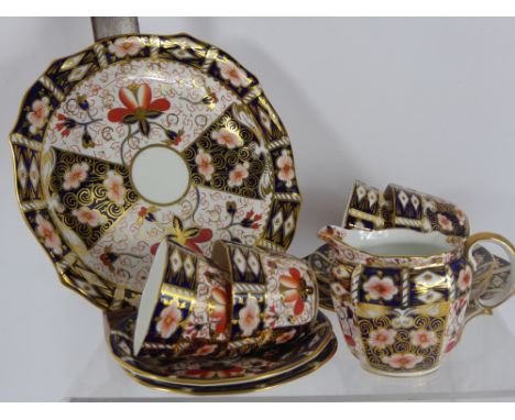 A Part Crown Derby Imari Pattern Tea Service, pattern nr 2451 comprising ,creamer, twelve cups, twelve saucers, twelve sandwi