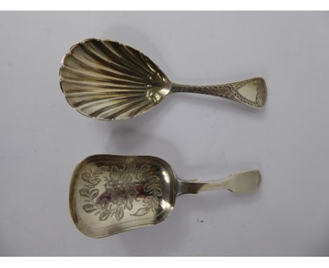 A Georgian Silver Caddy Spoon, London hallmark, dated 1813 mm rubbed, together with a Victorian London hallmark, dated 1858 m