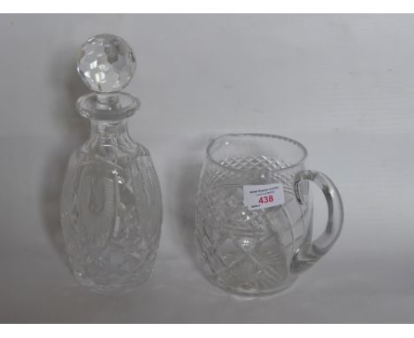 A Waterford Crystal Decanter, together with a cut glass decanter and water jug. (3)