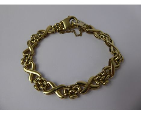 A Lady's 9 ct Yellow Gold Fancy Gate Link Bracelet, approx 12 gms