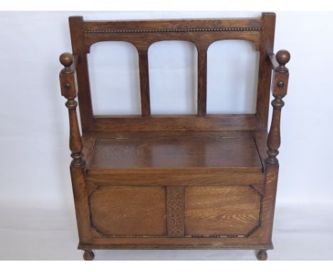 A Small Oak Monk's Bench, approx 34 x 76 x 92 cms, with hinged lid and storage.