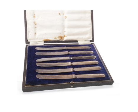 TWO SETS OF EARLY 20TH CENTURY SILVER HANDLED BUTTER KNIVES
the first, maker John Biggin, Sheffield 1900, 17cm long; the seco
