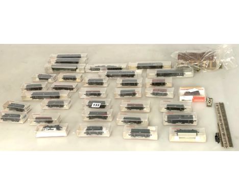 33 cased Fleischmann Piccolo N gauge trains and loose track and station building