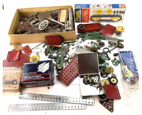 Large quantity of Meccano spare parts, flexible track pack, Meccano tractor &amp; trailer, Meccano E15R electric motor with r