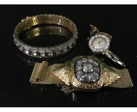 A Lady's Art Deco diamond set cocktail watch by Rotary, together with a lady's 1970's diamond and gold bracelet and a diamond