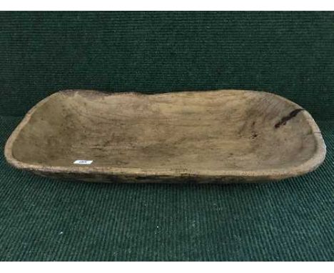 A rustic pine dough trough
