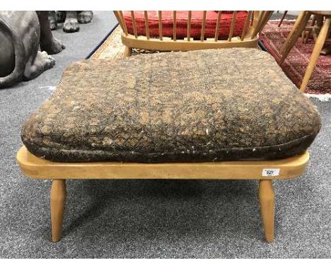 An Ercol light elm footstool