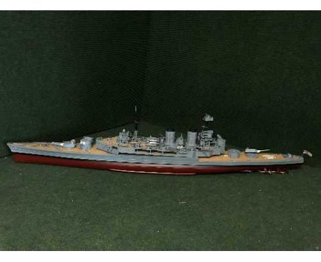 A large remote controlled scale model of a British battle ship
