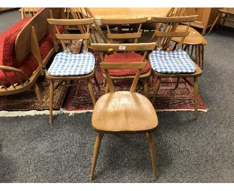 A set of four Ercol light elm kitchen chairs (4)