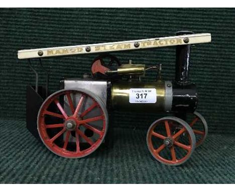 A Mamod live steam tractor engine