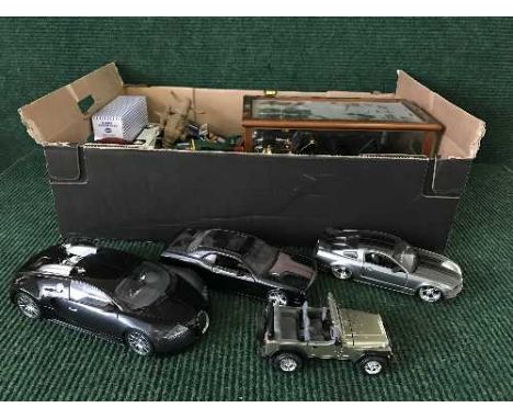 A box of large scale die cast vehicles, modern Dinky vehicles, vintage car in display case etc.