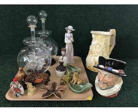 A tray of two ship's in bottles, Royal Doulton Beefeater character jug, Wade pieces, Beswick SCotch whisky decanter, Nao figu