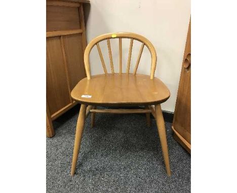 An Ercol light elm small dressing table chair