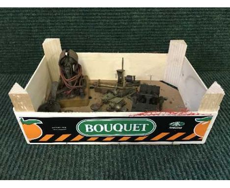 A box of miniature hand built live steam engine parts, paraffin burner etc