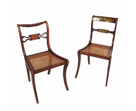 Four Regency dining chairs, three fitted with brass inlay, one with Trafalgar rope bar back, all having cane seats and sabre 