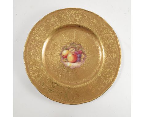 A Royal Worcester plate, acid gilt border, decorated with fruit to mossy background by Reed, diameter 10.5ins   Condition rep