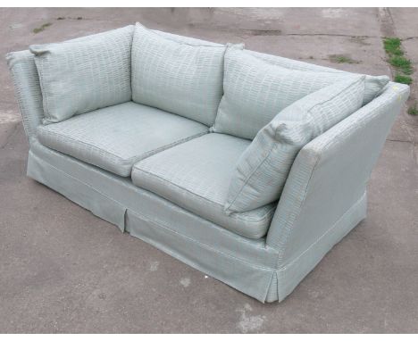 A two seater sofa together with matching armchair, sofa width 82ins