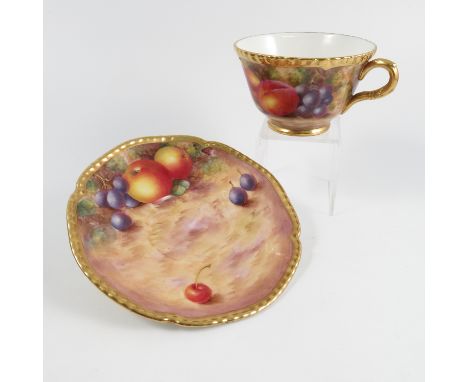 A Royal Worcester tea cup and saucer, decorated with fruit by Freeman   Condition report:  Good condition