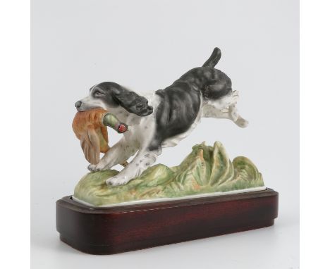 A Royal Worcester model, Springer Spaniel, from the Series of Sporting Dogs modelled by Doris Lindner, with plinth base, heig