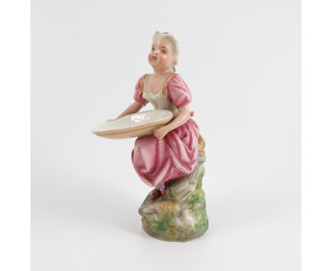 A 19th century Royal Worcester figure, of a woman wearing a pink dress, holding an oval bowl, impressed mark, height 5.75ins 