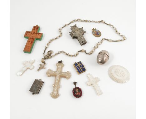 A 19th century silver vinaigrette, of egg form, the pierced grill engraved with leaves, together with a locket pendant, set w